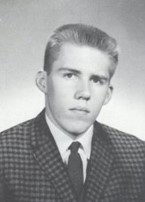 A person in a suit and tie

Description automatically generated