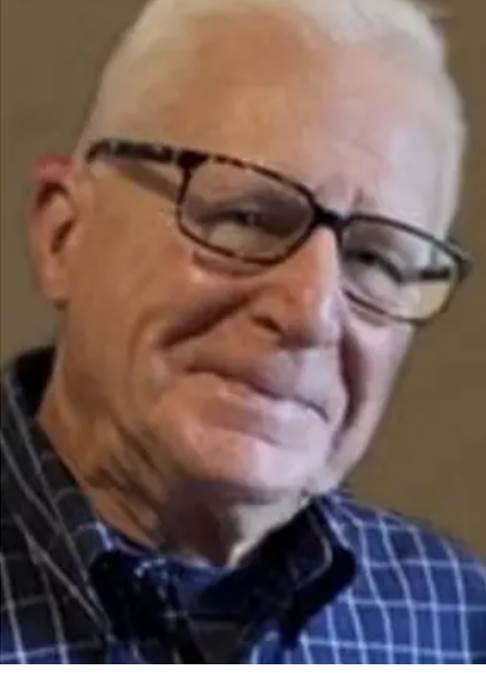 A person wearing glasses and a blue plaid shirt

AI-generated content may be incorrect.